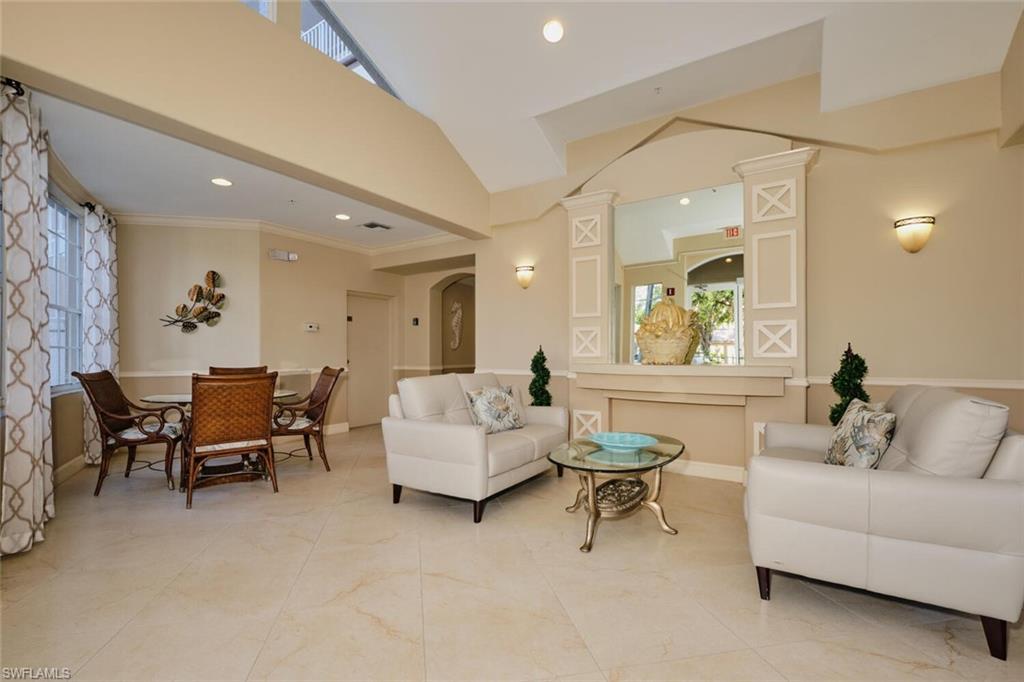 Image 3: Living room featuring ornate columns, plenty of natural light, and ornamental molding