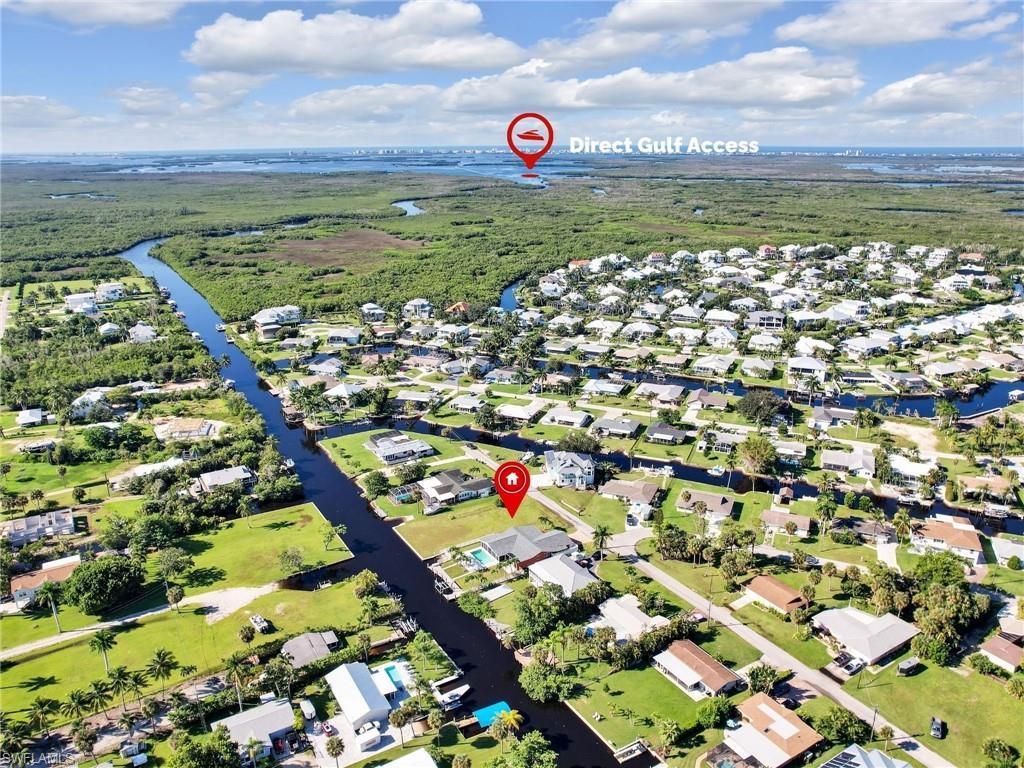 Image 2: Aerial view featuring a water view