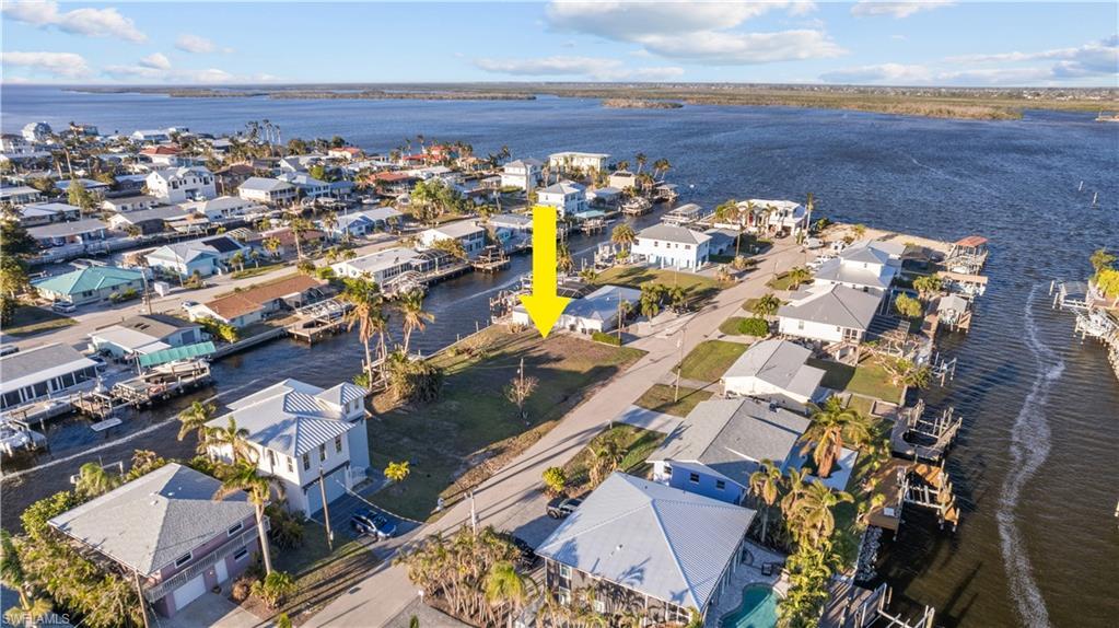 Image 1: Drone / aerial view with a water view