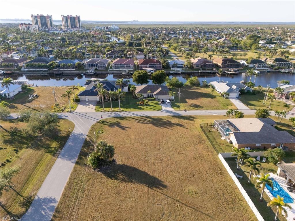 Image 3: Aerial view featuring a water view
