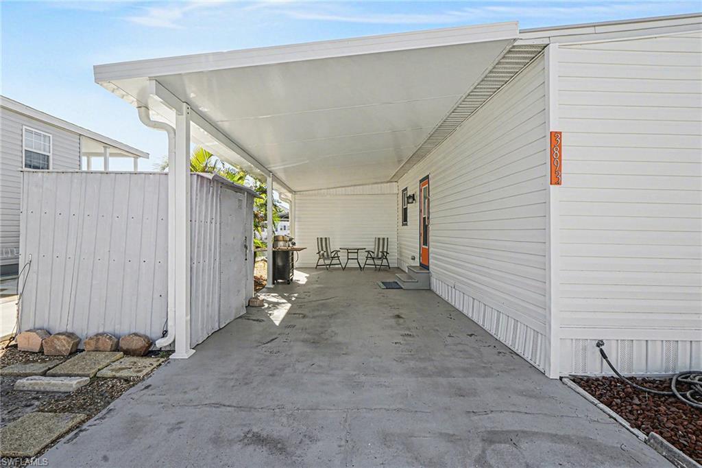 Image 3: View of car parking featuring a new carport