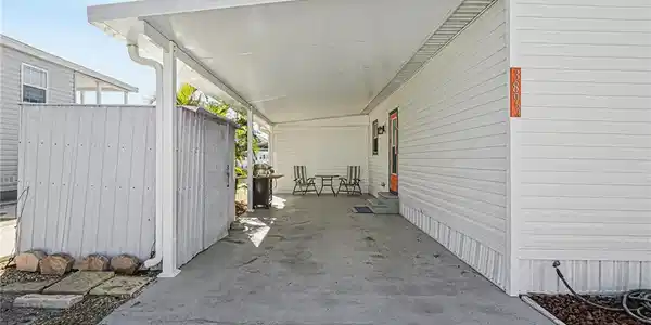 Image 3: View of car parking featuring a new carport