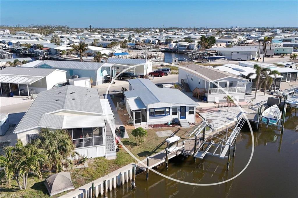 Image 4: Bird's eye view with a water view