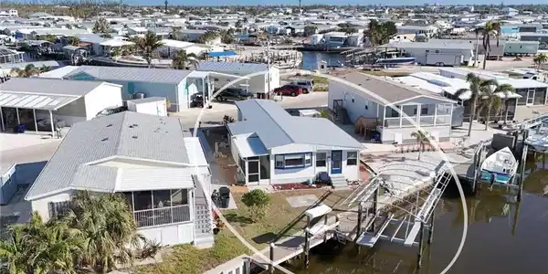 Image 4: Bird's eye view with a water view