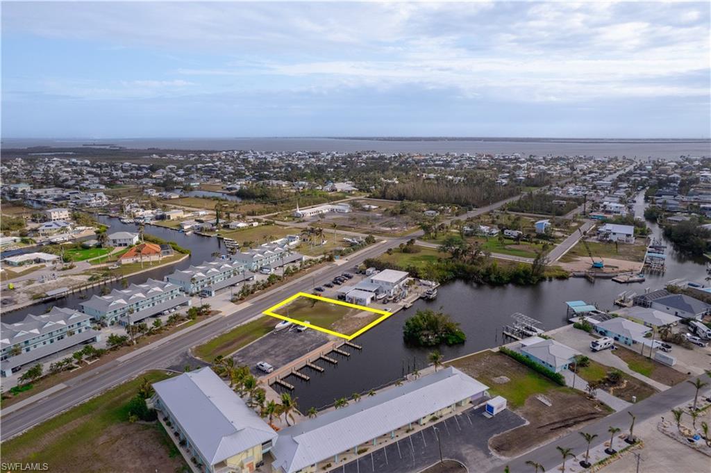 Image 4: Aerial view featuring a water view