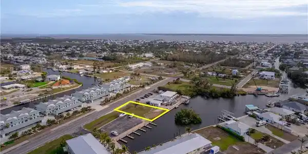 Image 4: Aerial view featuring a water view