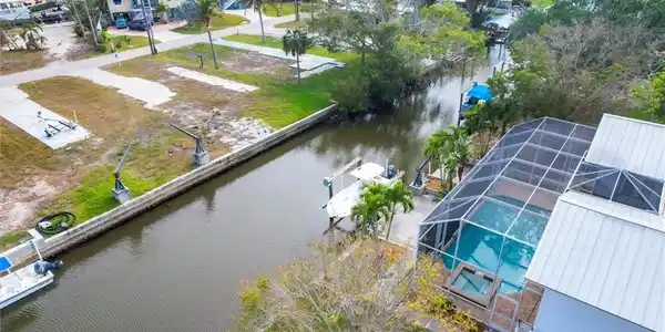 Image 2: Birds eye view of property featuring a water view