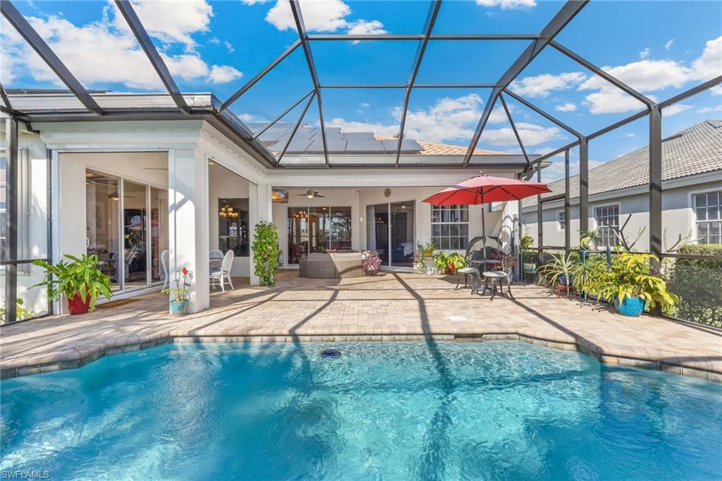 Image 3: Extended pool deck.   Solar panels for whole house.