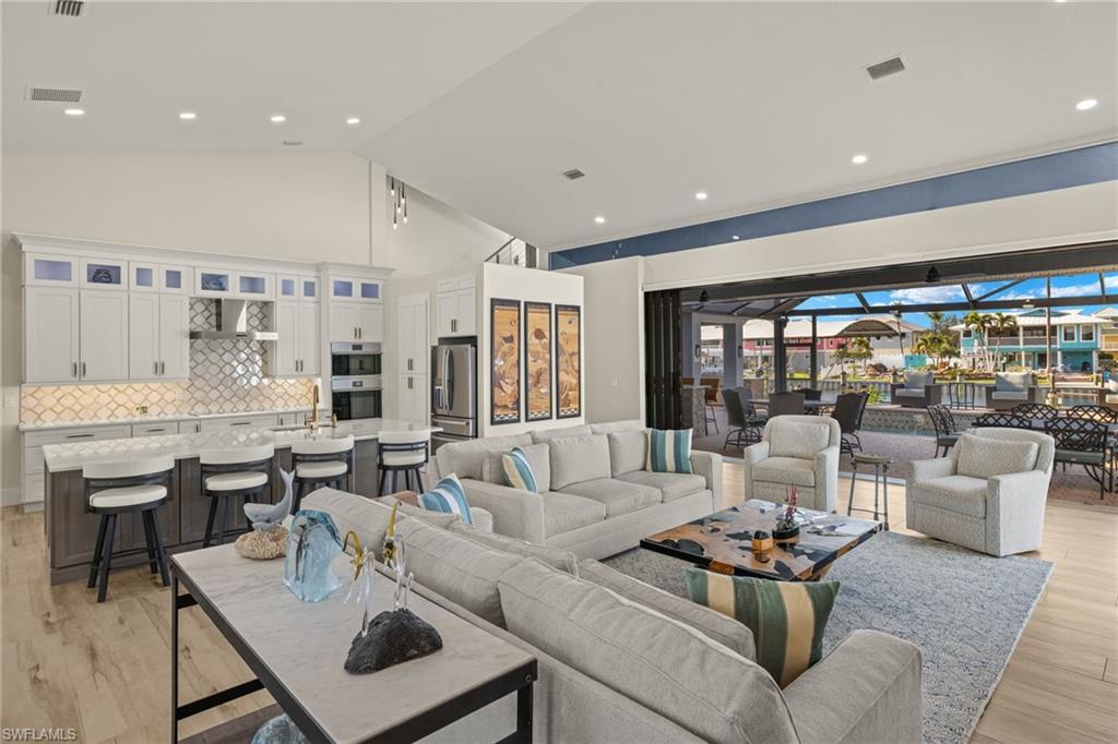 Image 3: Gathering room with open lanai