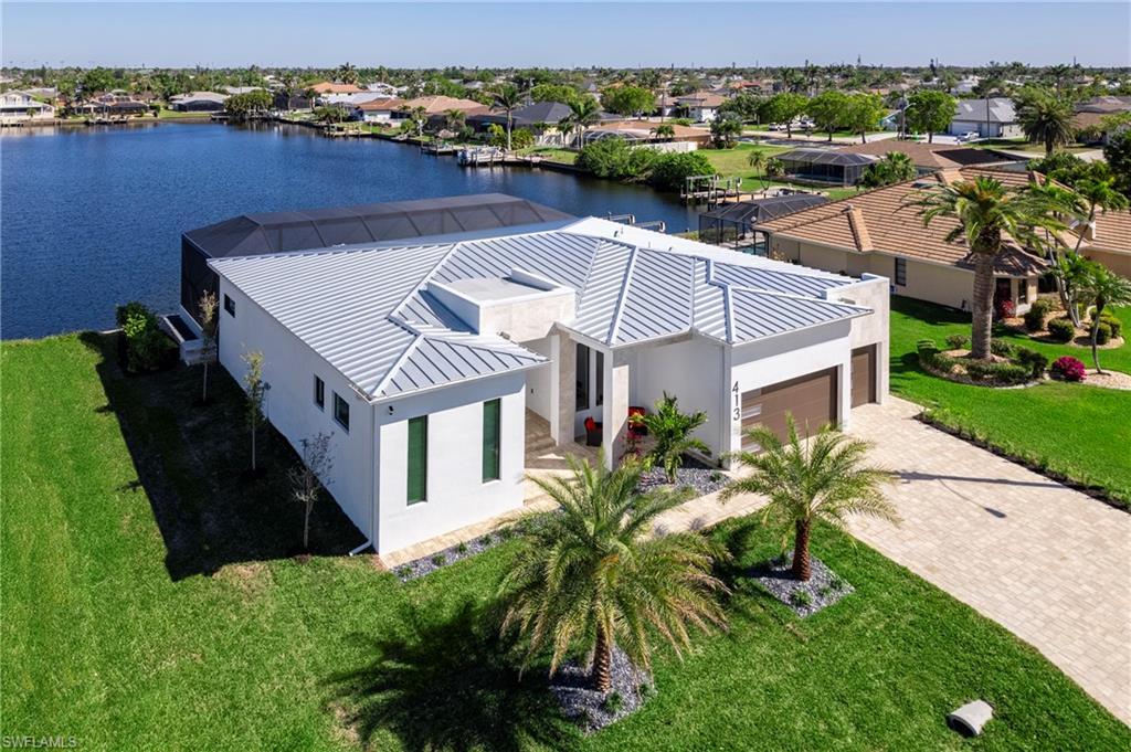 Image 4: Aerial view with a residential view and a water view