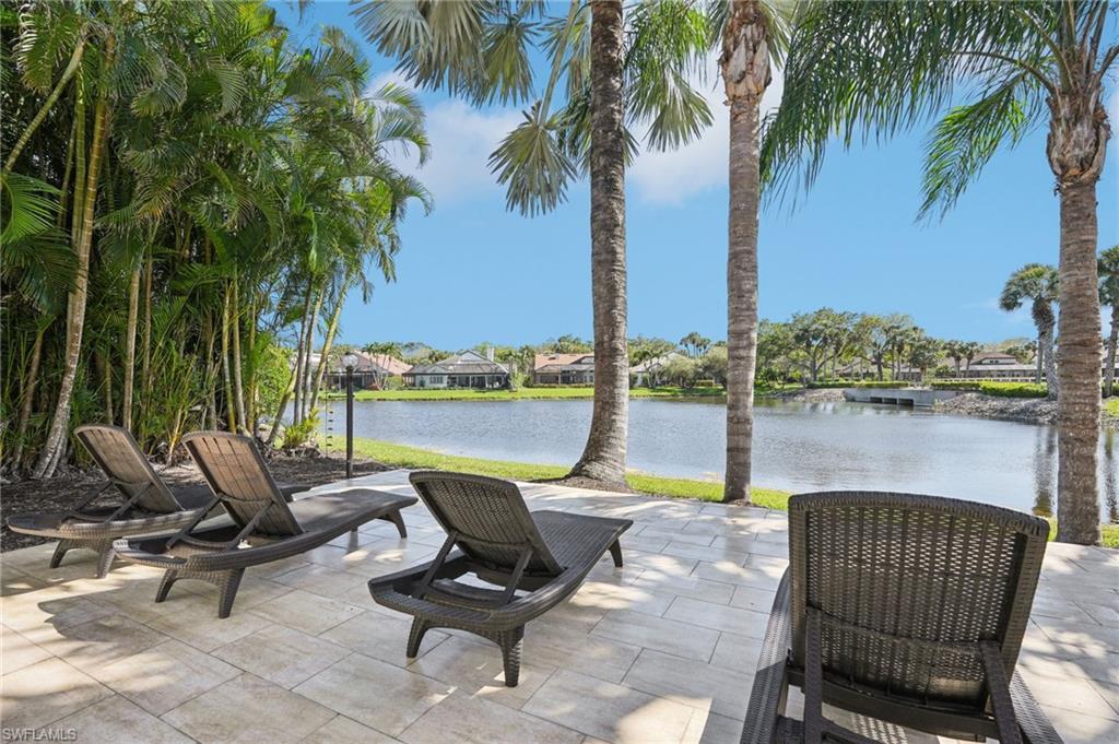Image 2: View of patio / terrace with a water view