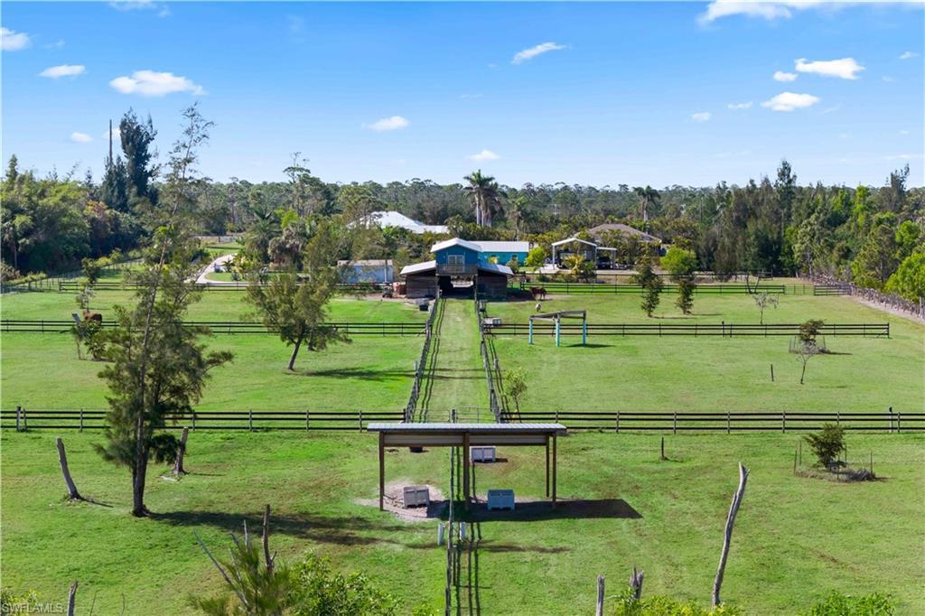 Image 2: A tropical equestrian haven nestled on 8.85 acres of pristine land in Southwest Florida.