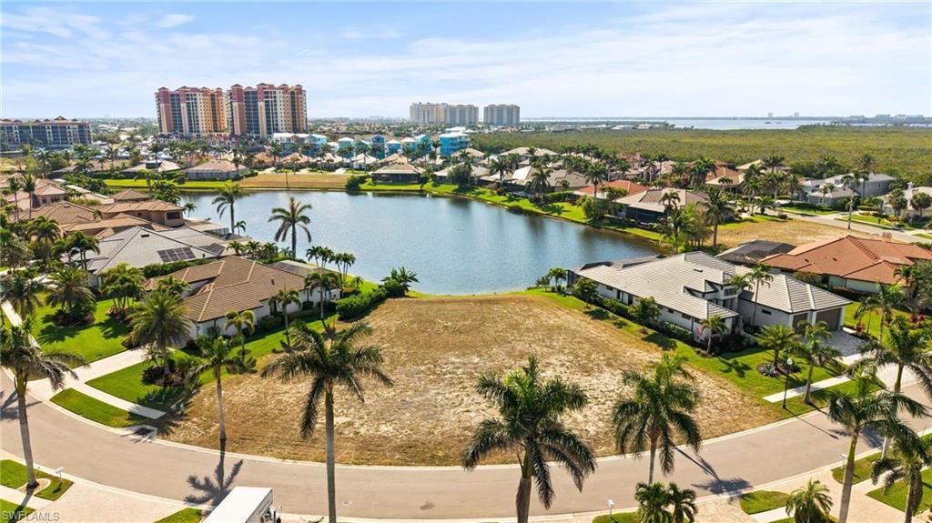 Image 1: Birds eye waterfront view of property