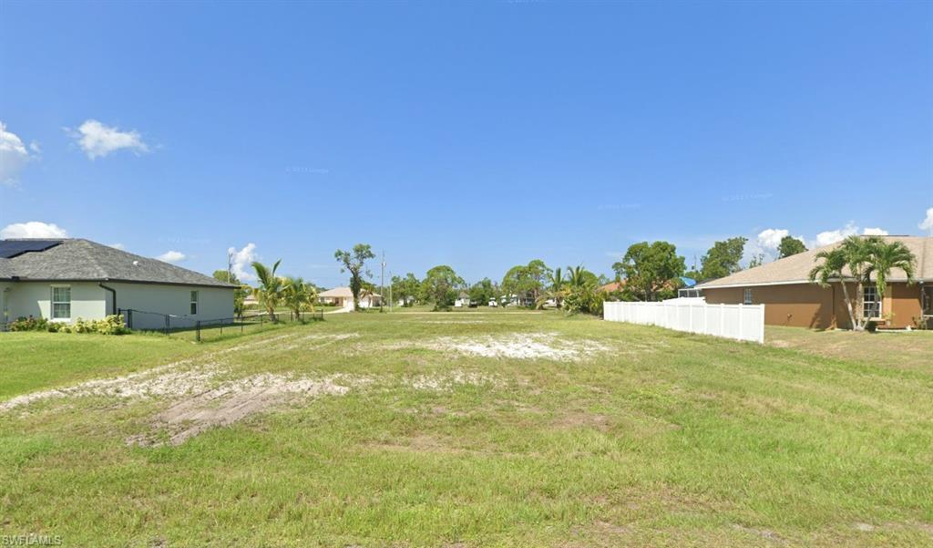 Image 2: View of yard with fence