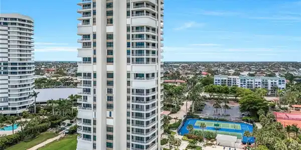 Image 2: View of apartment building / complex featuring a view of city