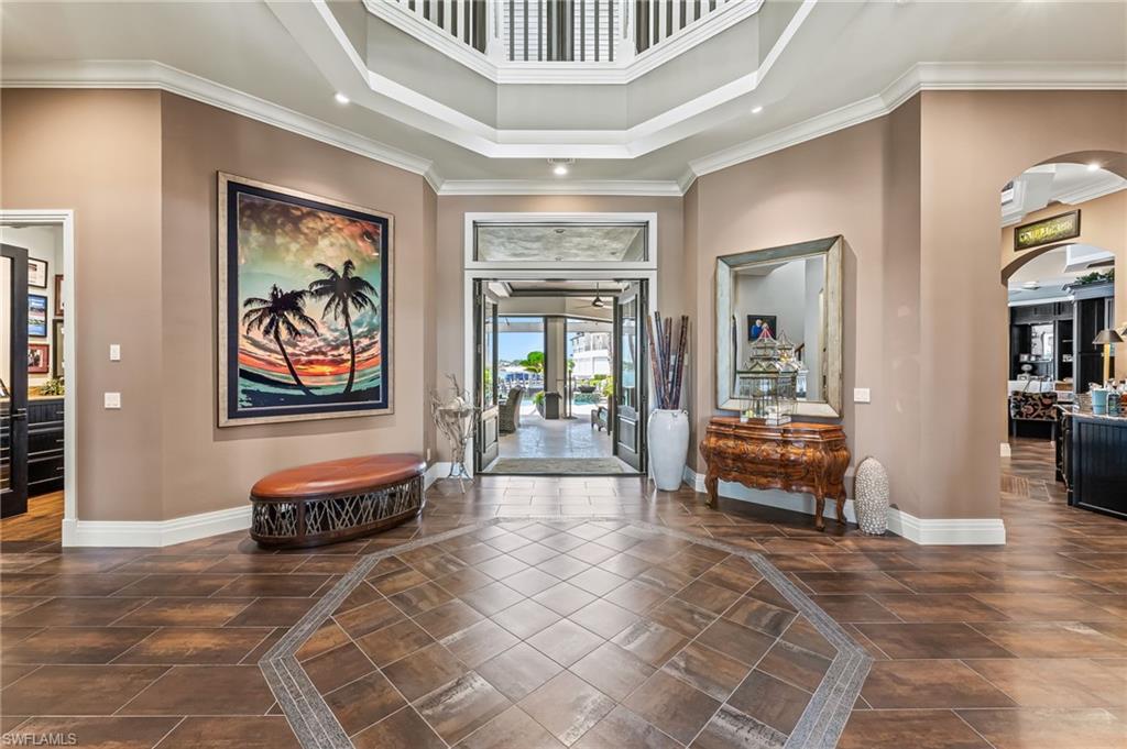 Image 4: Entrance foyer featuring a high ceiling