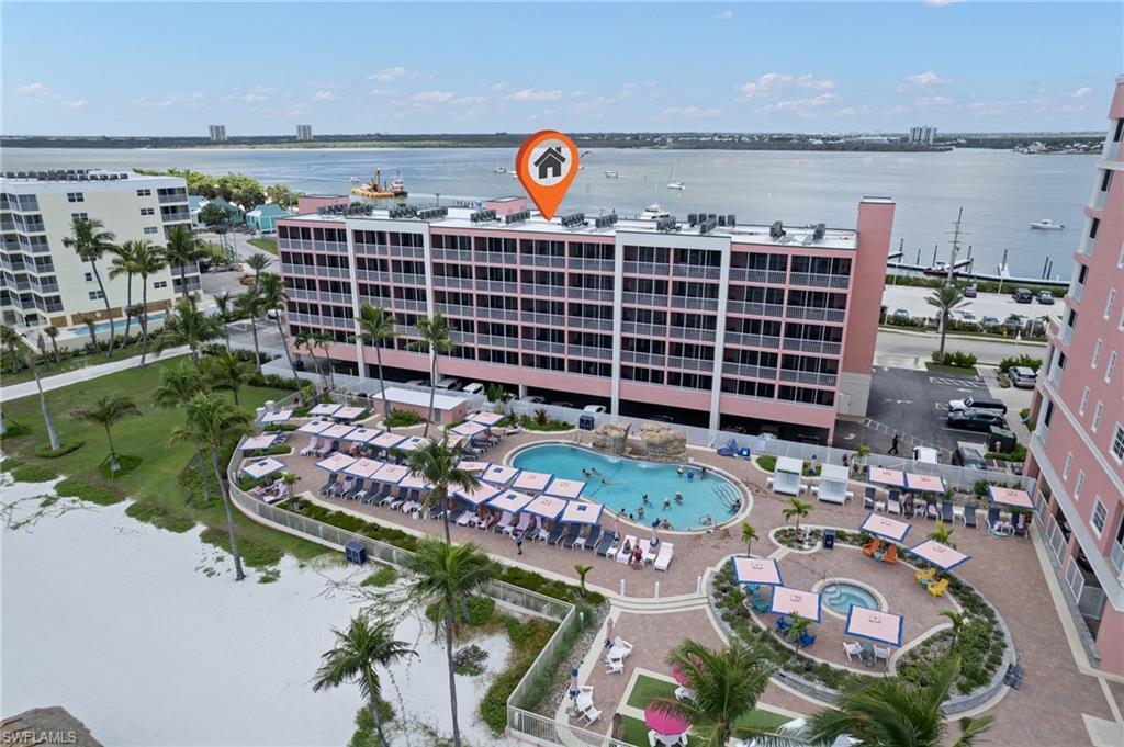 Image 1: Aerial of the unit building and pool area