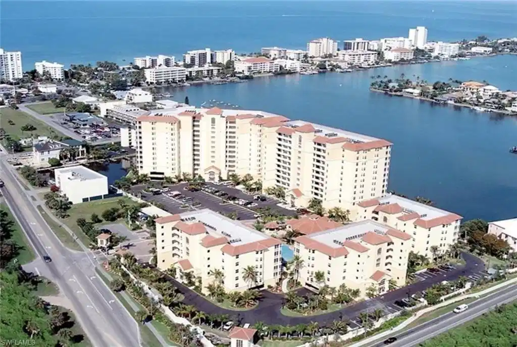 Image 1: Aerial view featuring a water view