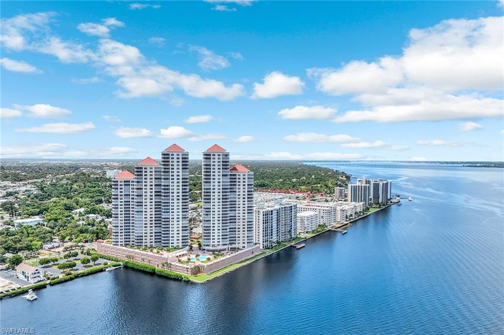 Image 3: Aerial view of the high-rise towers overlooking the Caloosahatchee River, offering unmatched waterfront living.