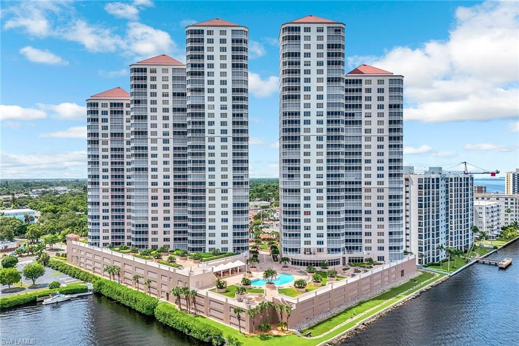 Image 4: Sleek, glass-lined towers boast modern design and overlook a private elevated amenity deck