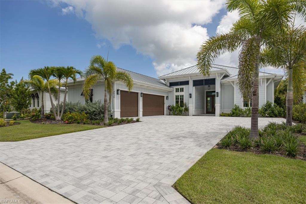 Image 2: 4566 Seagrove Landing Way is a pre-construction purchase agreement for the construction of a customized Bay plan in Coconut Landing. The photos in this listing are of a recently completed model of the same floor plan with finishes that are similar but not identical to the planned finishes for 4566 Seagrove Landing Way. One lot remains to build a Bay plan in the community.
