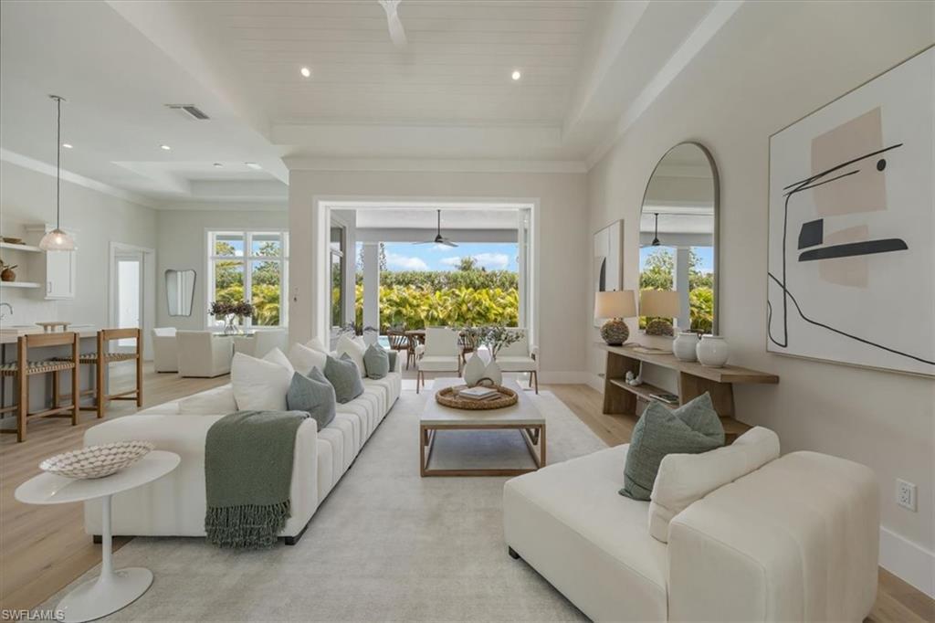 Image 4: 4566 Seagrove Landing Way is a pre-construction purchase agreement for the construction of a customized Bay plan in Coconut Landing. The photos in this listing are of a recently completed model of the same floor plan with finishes that are similar but not identical to the planned finishes for 4566 Seagrove Landing Way. One lot remains to build a Bay plan in the community.