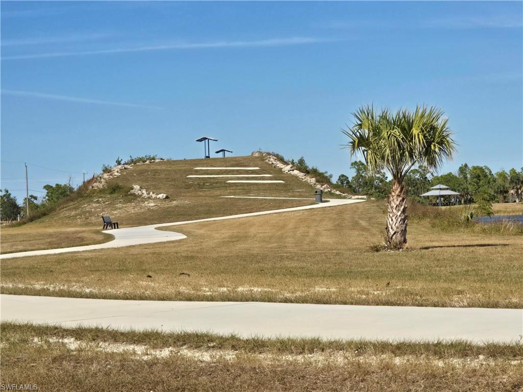 Image 3: View of community featuring a yard