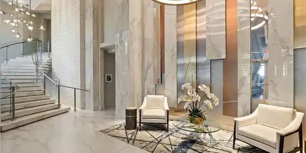Image 4: Elegant lobby with marble staircase