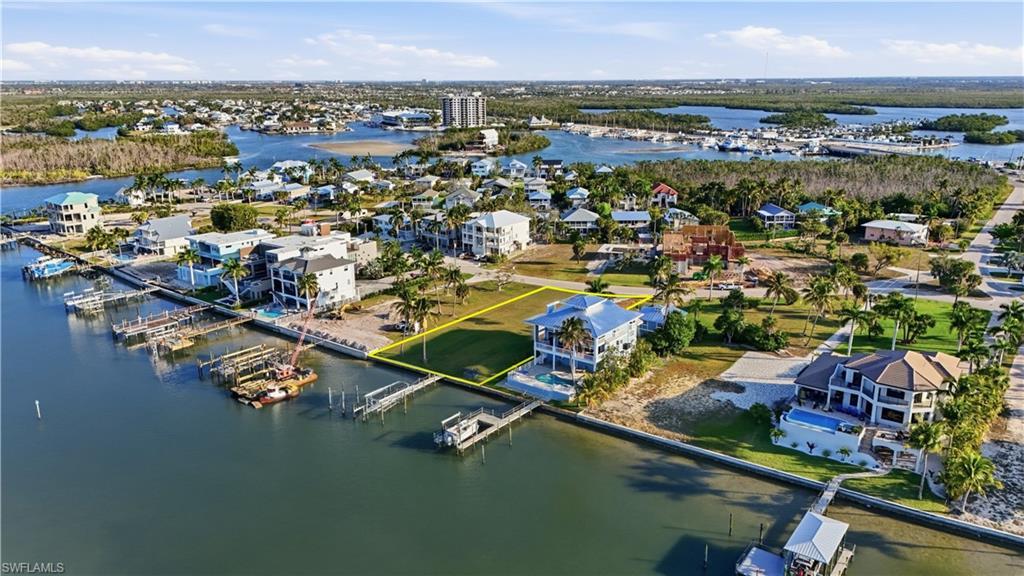 Image 4: Drone / aerial view of a large body of waterchange color of water into natural dark blue canal water
