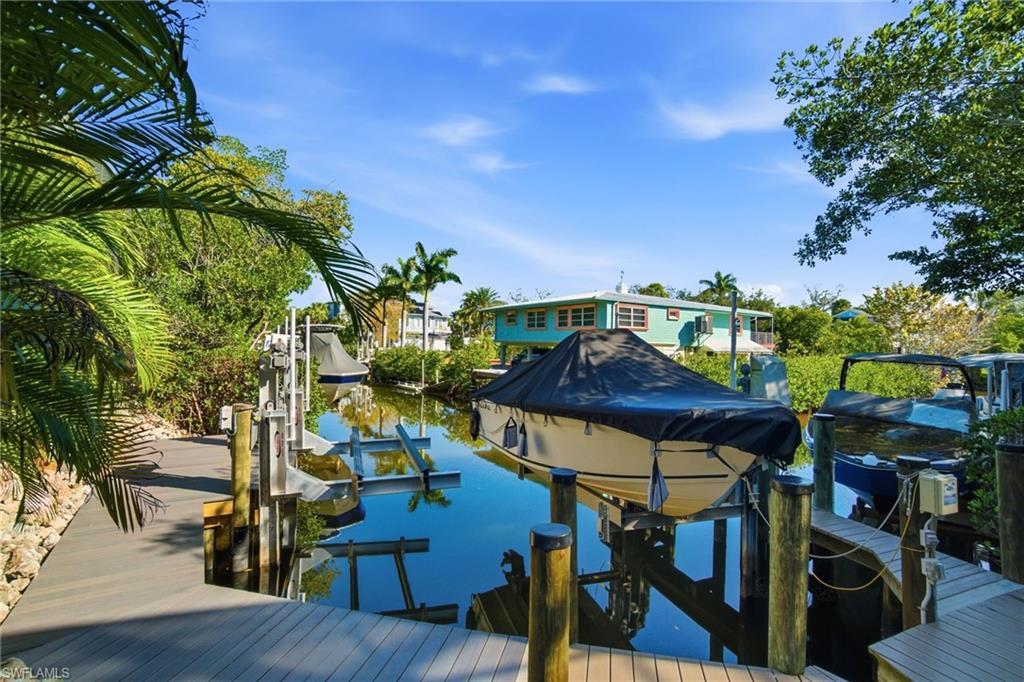 Image 2: Live the beach & boater lifestyle by joining one of the many Gulf-access luxury boat clubs or store your own boat at one of the multiple marinas located within 1-2 miles!