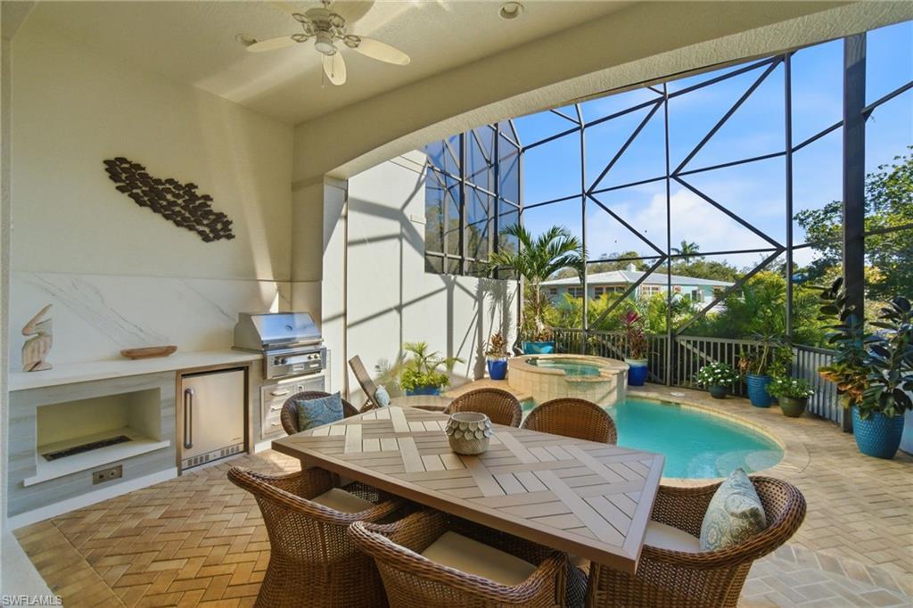 Image 3: NATURAL GAS, whole house GENERATOR, SALTWATER POOL/SPA, private ELEVATOR, electric storm screens & incredible quality/craftsmanship.