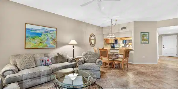 Image 4: Living area featuring ceiling fan and recessed lighting