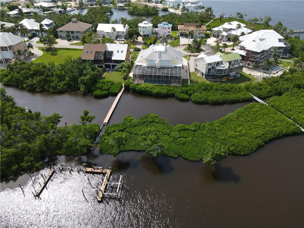 Image 2: Bird's eye view featuring a water view