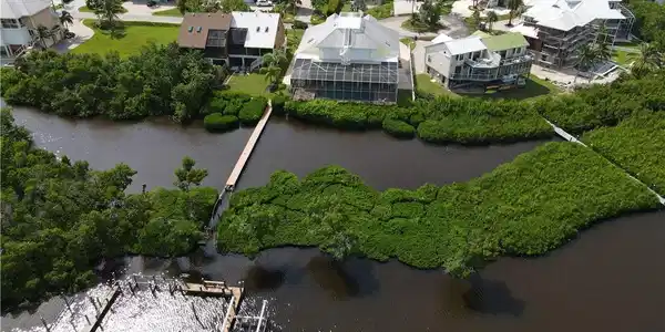 Image 2: Bird's eye view featuring a water view