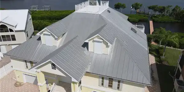 Image 3: Birds eye view of property with a water view