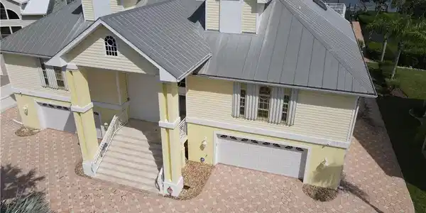 Image 4: View of front of property featuring a garage
