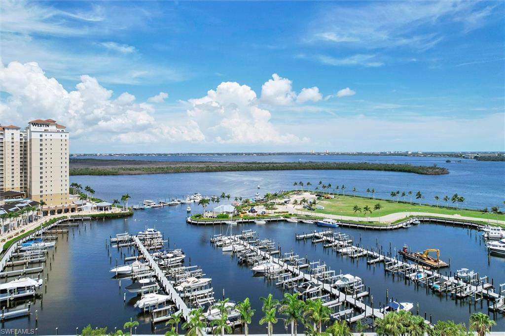 Image 3: Water view featuring numerous boat docks