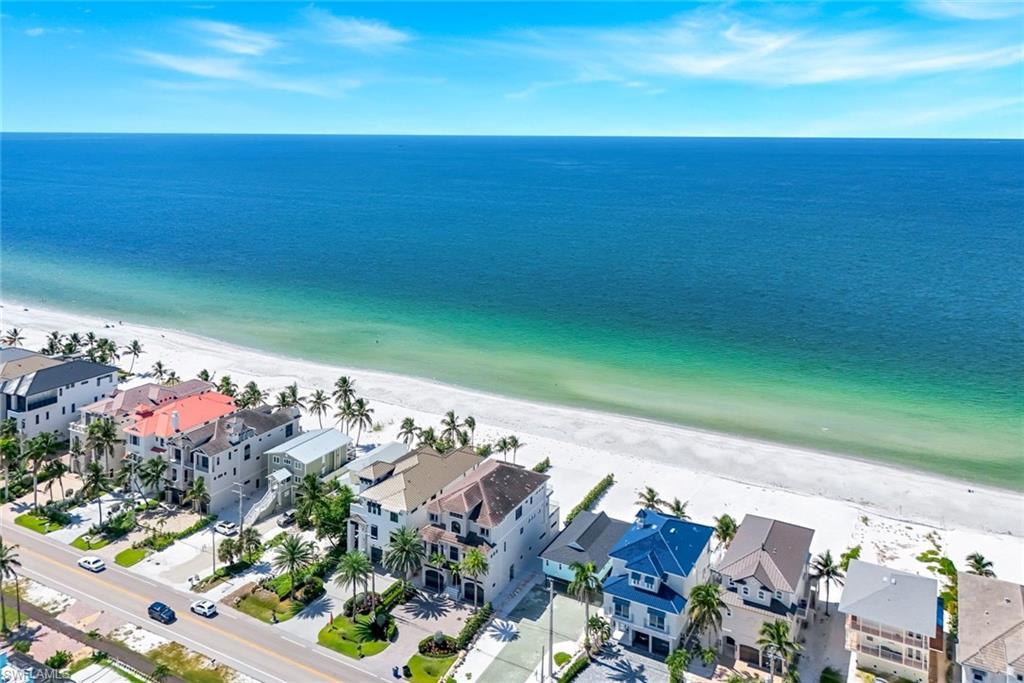 Image 3: Aerial view of expansive beach