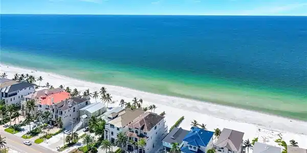Image 3: Aerial view of expansive beach