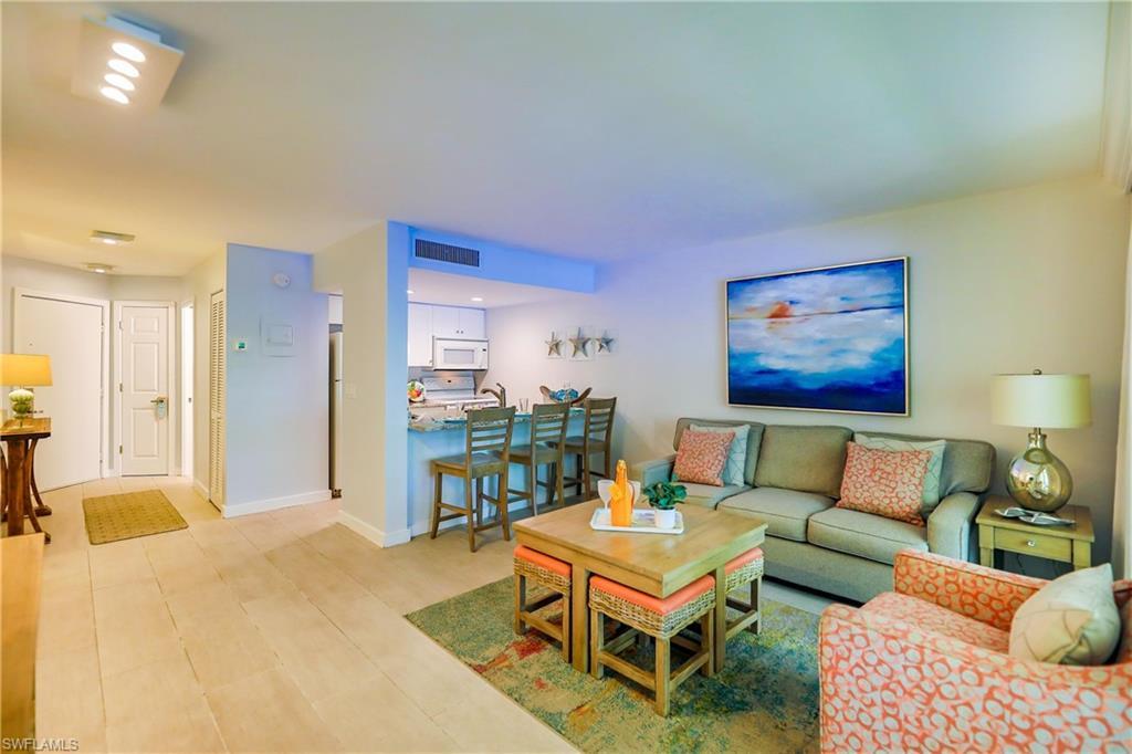 Image 2: Living room featuring baseboards