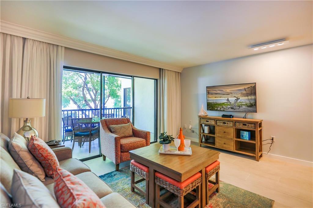 Image 3: Living room featuring baseboards