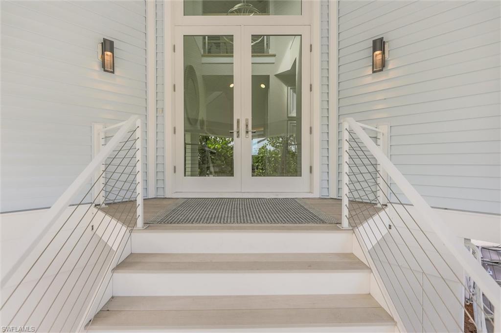 Image 4: Stairs with french doors