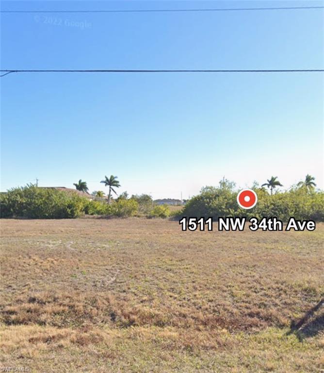 Image 2: View of yard featuring a view of rural / pastoral area