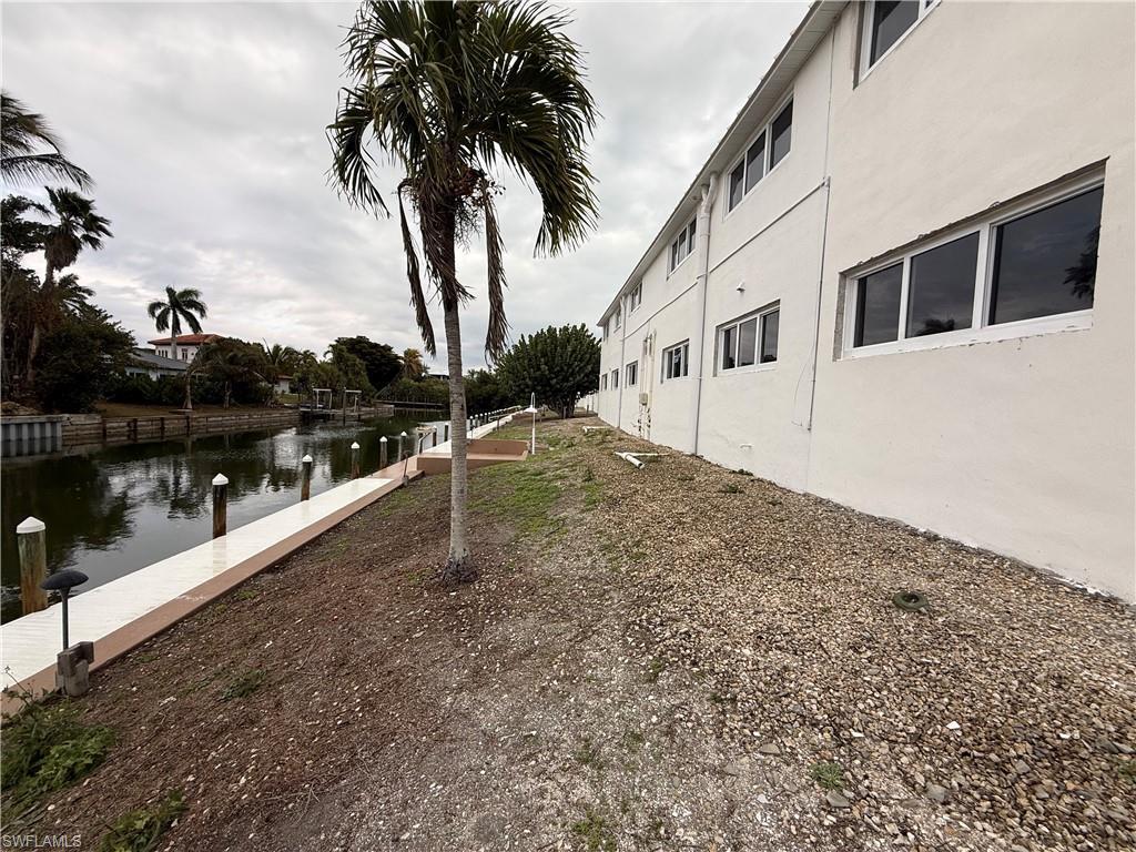 Image 4: View of yard with a water view
