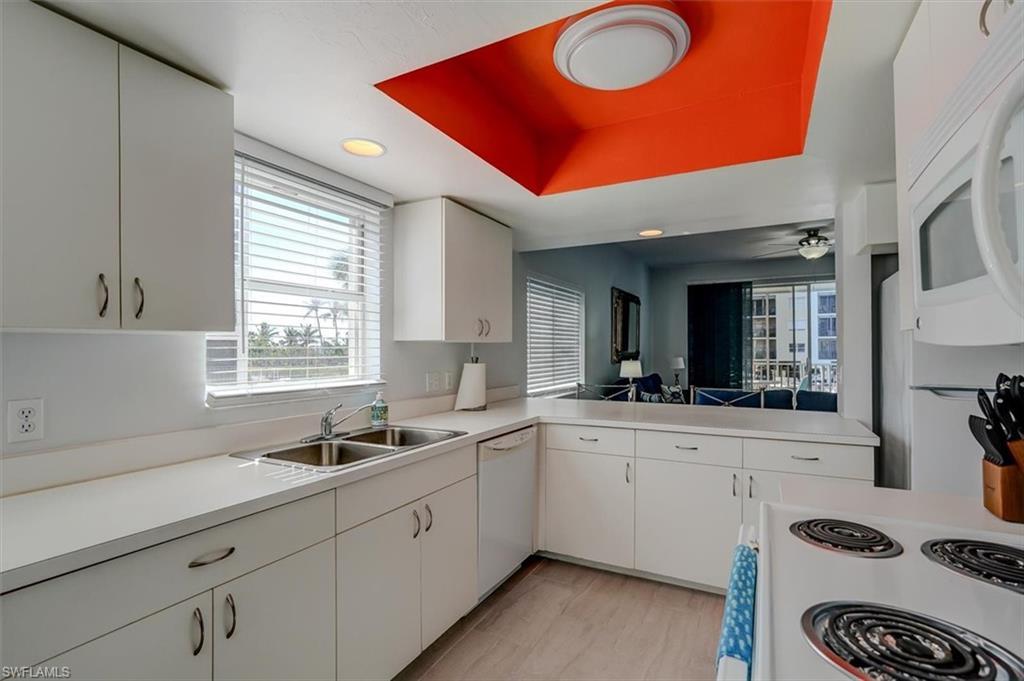 Image 3: Note natural light flooding into the kitchen facing South.
