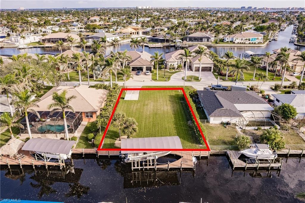 Image 1: Drone / aerial view featuring a water view