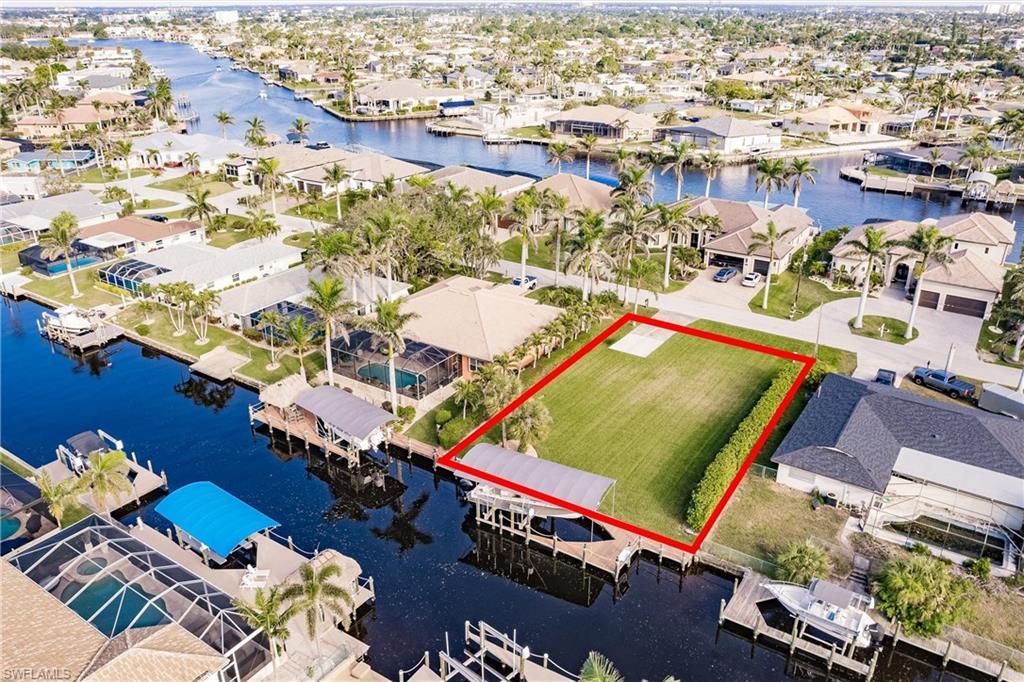 Image 3: Aerial view featuring a water view