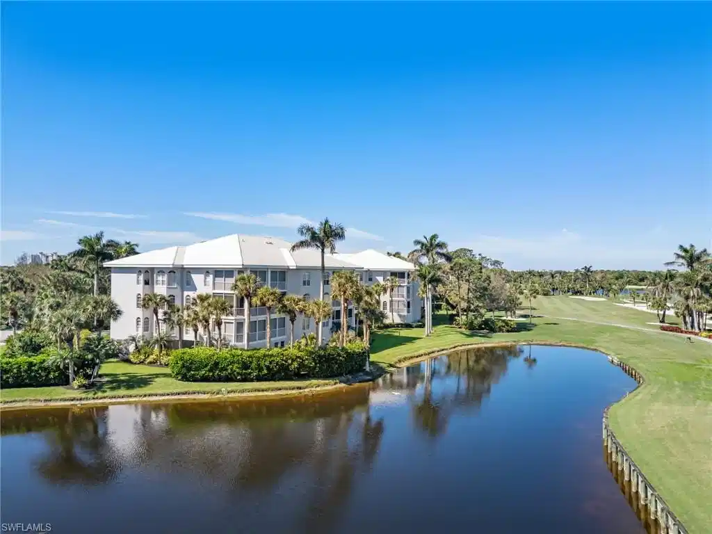 Image 1: Beautiful end unit overlooking the lake and golf course