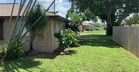 Image 3: View of yard with fence