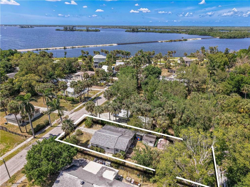Image 4: Aerial view featuring a water view